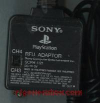 RFU Adaptor Official Sony - SCPH-1121 Hardware Shot 200px